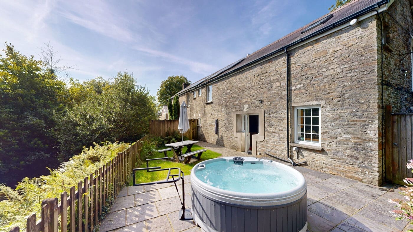 Riverside spa at Y Stabl holiday cottage