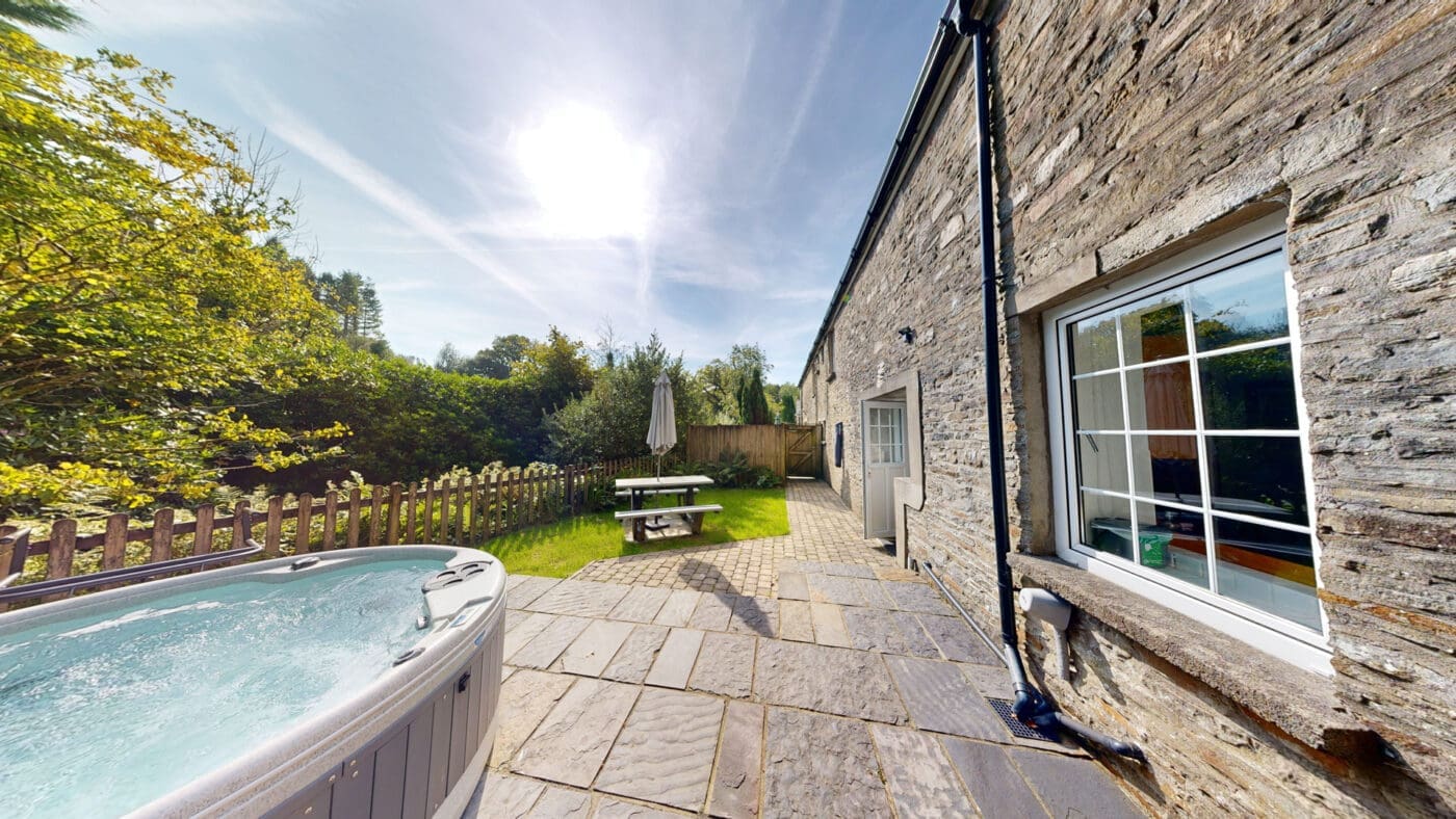 Riverside Hot Tub at Y Stabl Holiday Cottage near Swansea